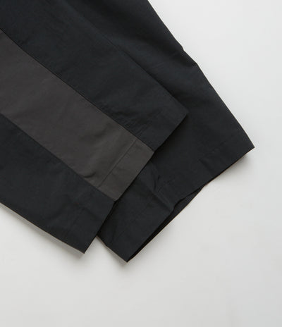 Umbro Rose Crest Track Pants in Black and Dark Gray