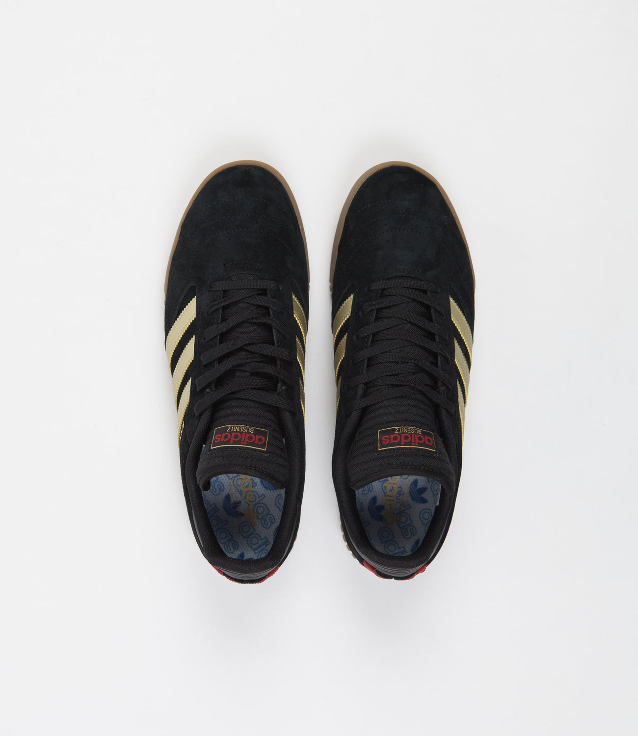 Adidas black shoes with gold stripes discount