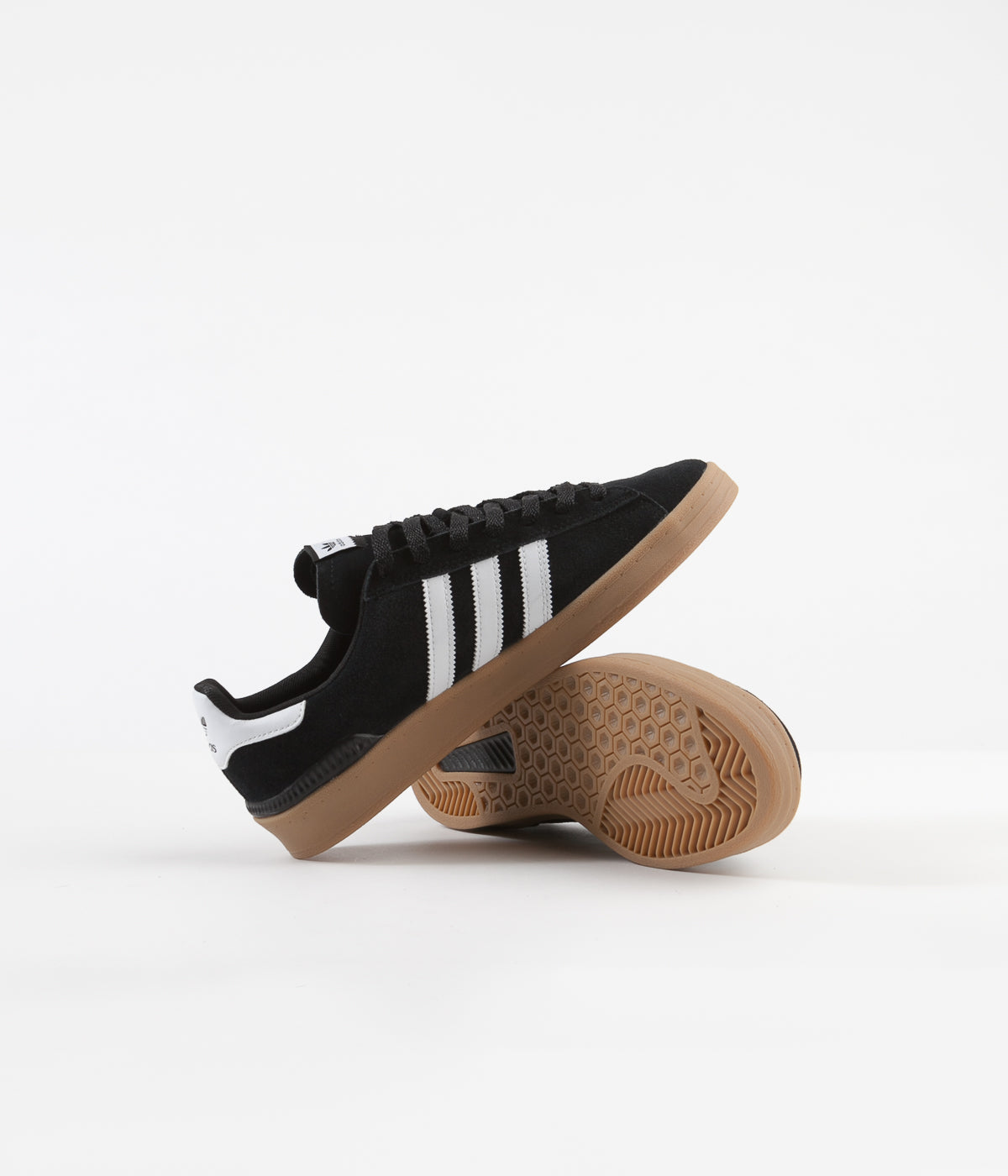 Black and white adidas with brown sole online