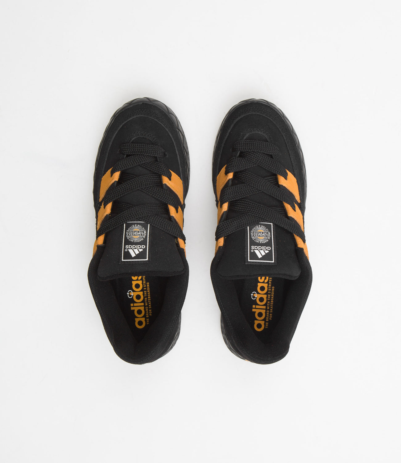 Adidas black orange stripes best sale