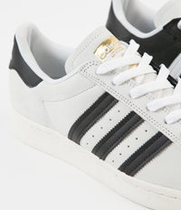 Superstar 2 gold stamp black white sales