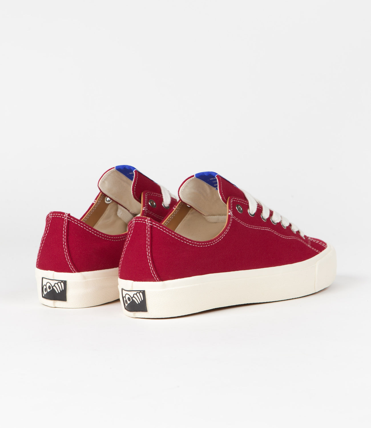 Red and white canvas shoes deals