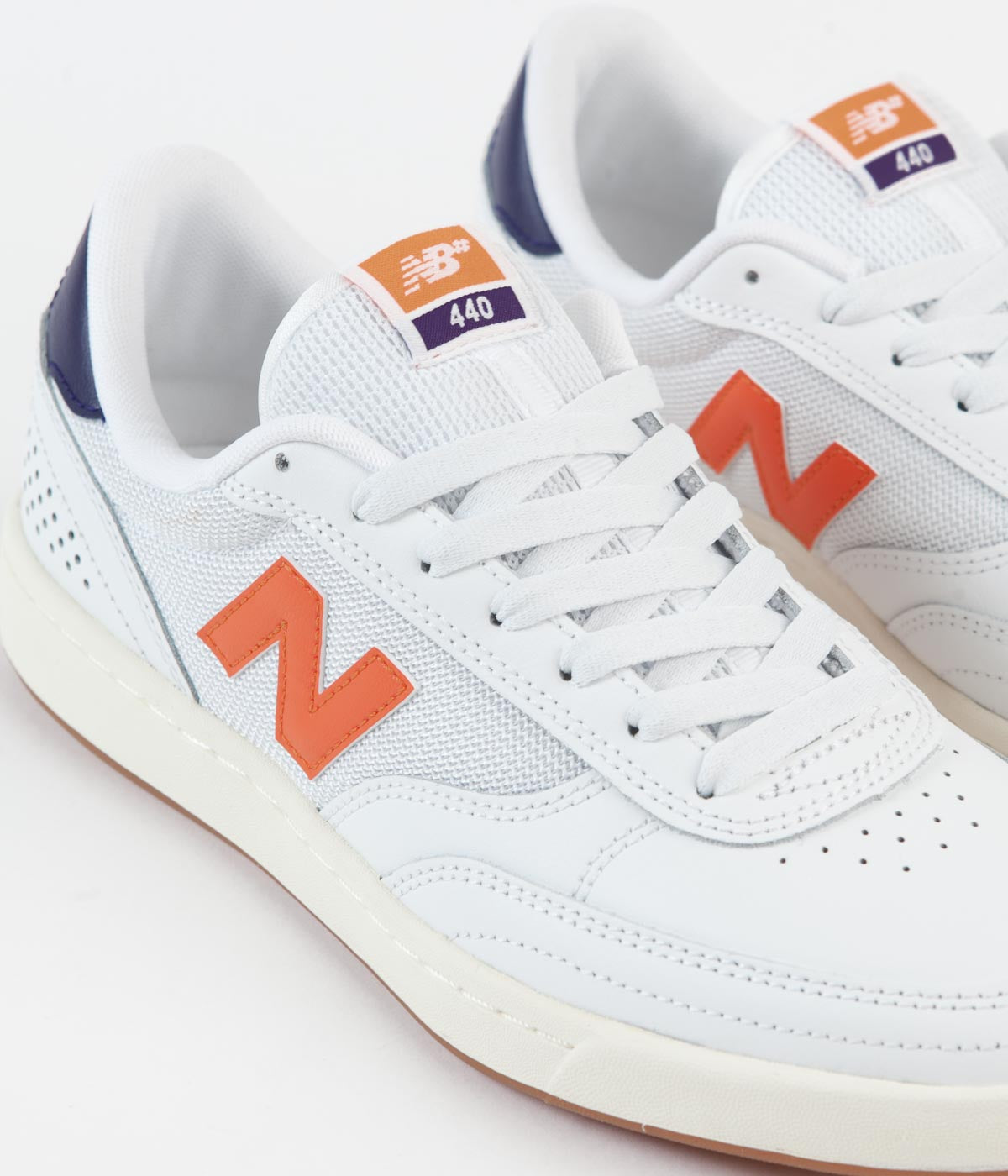 Orange and white new balance outlet