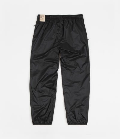 Nike ACG Cinder Cone Windshell Pants in Off Noir and Dark Smoke Grey / Summit White