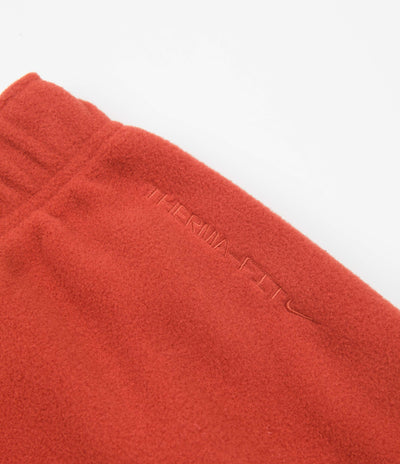 Nike ACG Polartec Wolf Tree Pants - Cinnabar / Off Noir / Thunder Blue