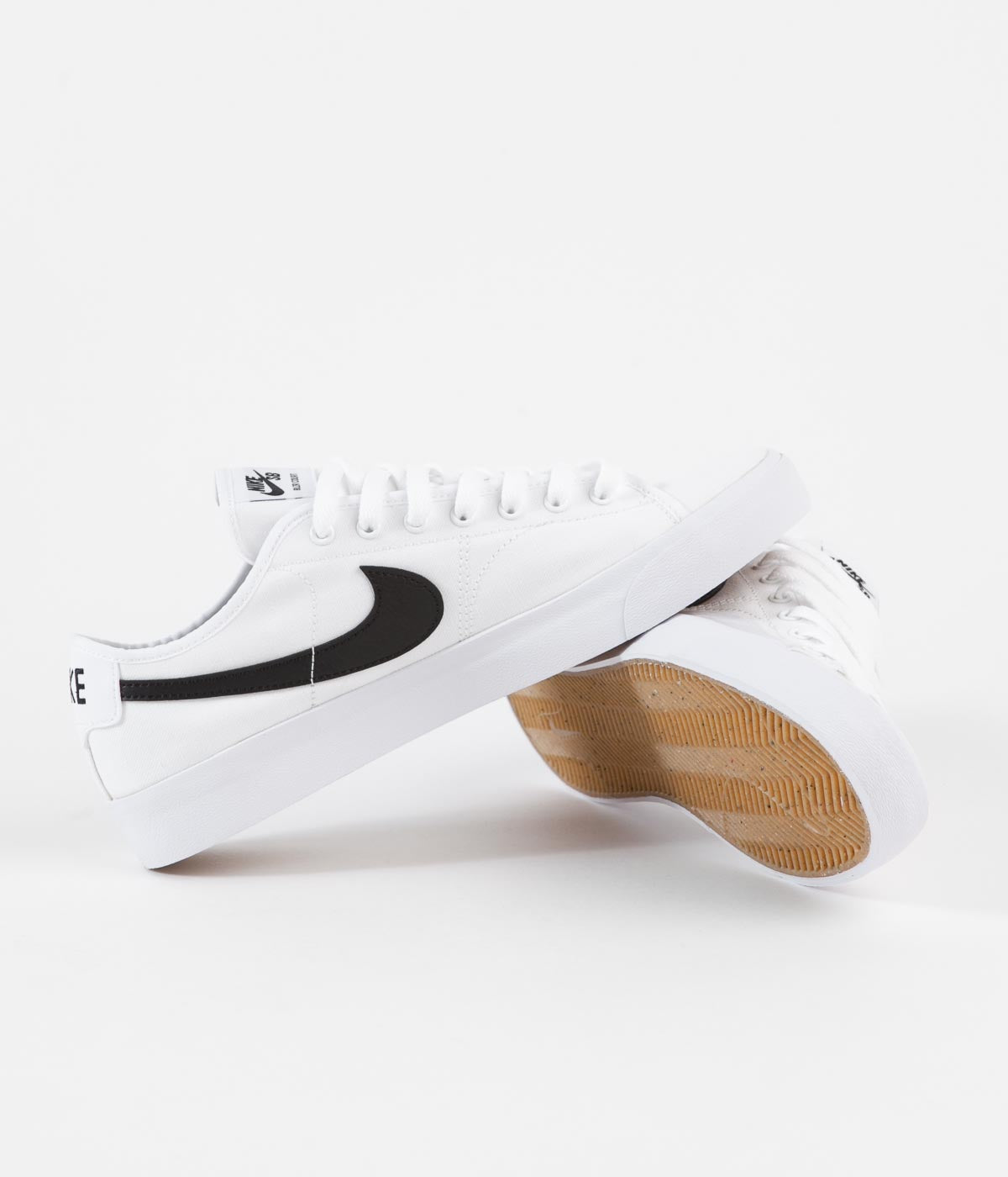 Nike white shoes with black swoosh Clearance