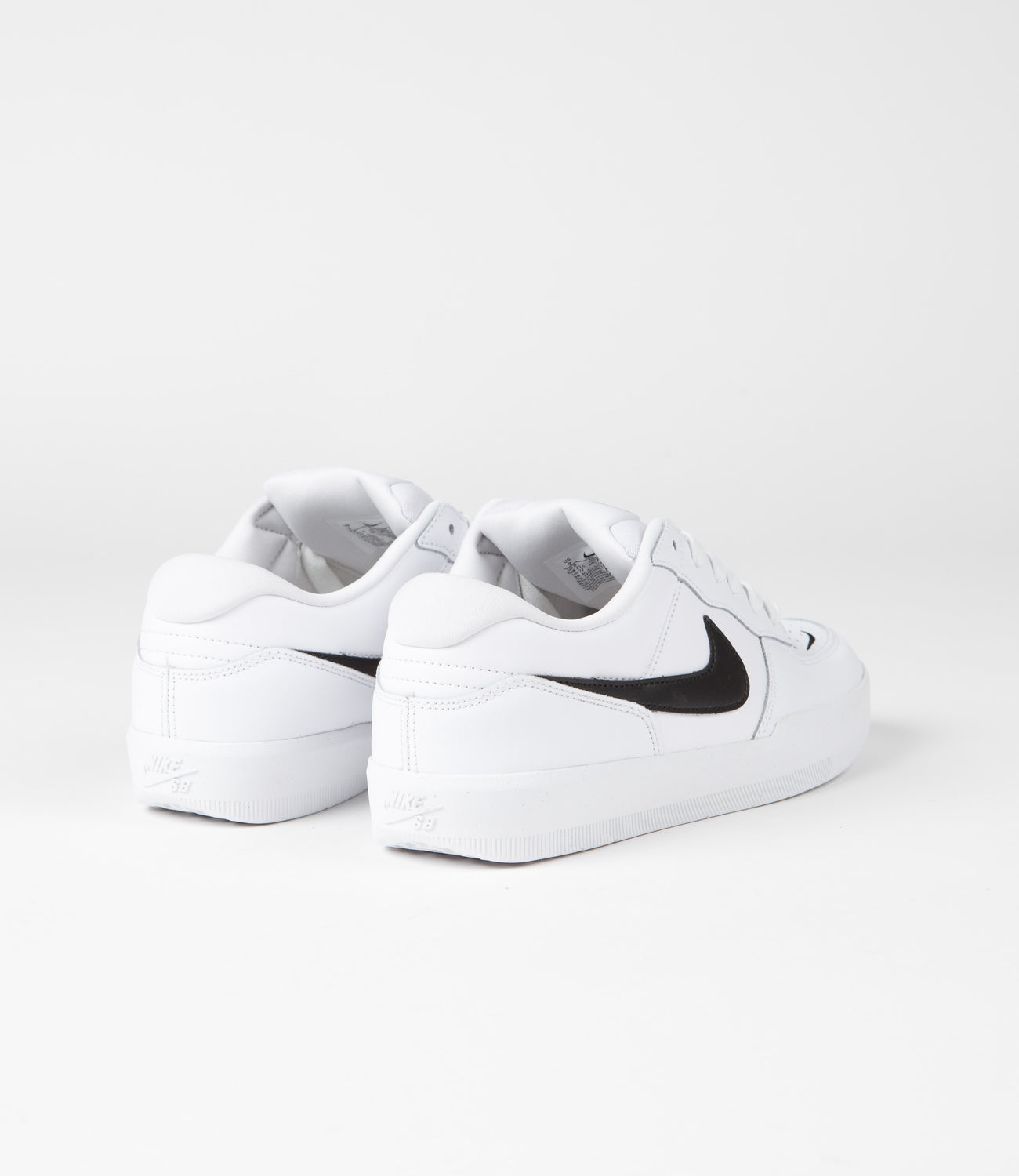 Nike flat white shoes 2025