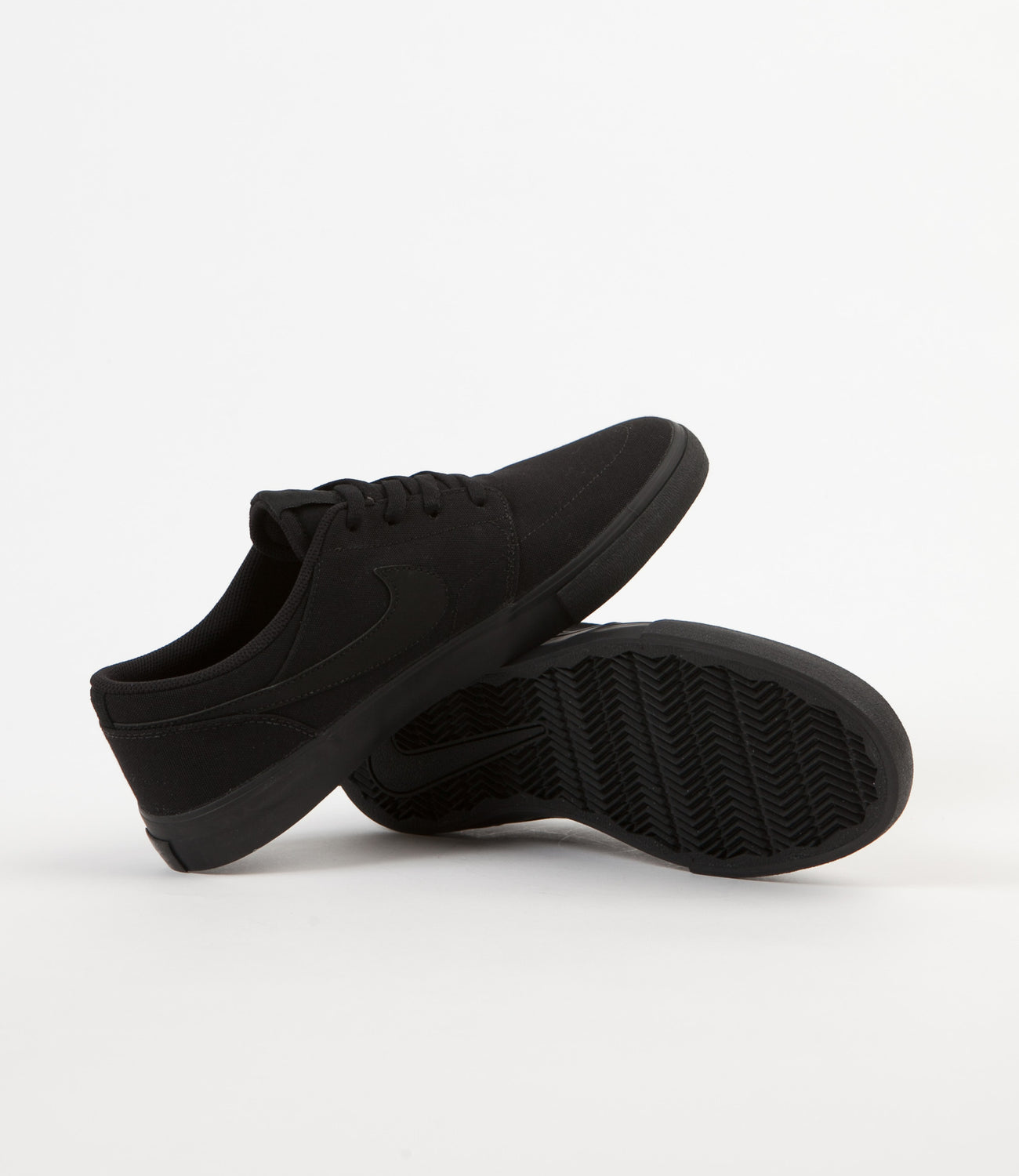 Nike sb portmore ii all black canvas skate shoes discount