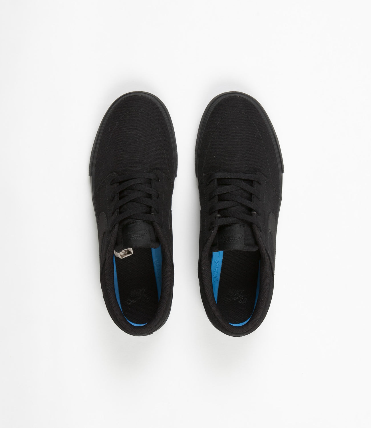 Nike sb portmore ii black & discount white canvas skate shoes