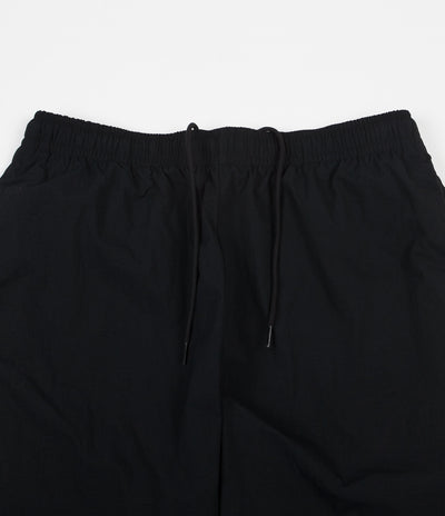 Nike SB Swoosh Track Pants in Black and White / White