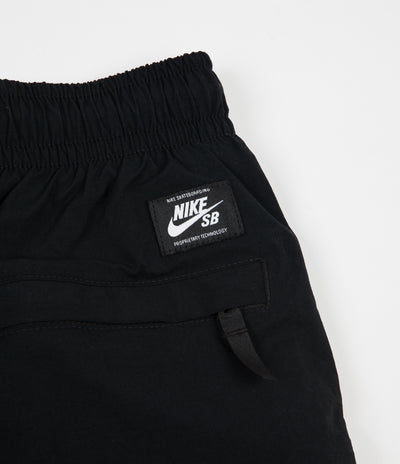 Nike SB Swoosh Track Pants in Black and White / White