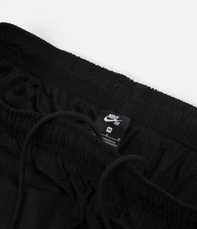 Nike SB Swoosh Track Pants in Black and White / White