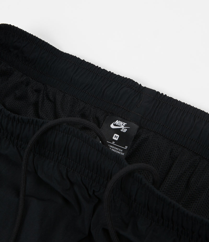 nike sb swoosh track pants white