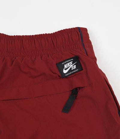Nike SB Swoosh Track Pants - Team Crimson / Obsidian / Obsidian