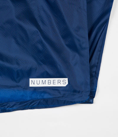Nike SB x Numbers Jacket - Coastal Blue / Sail / White