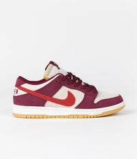 Nike SB x Skate Like A Girl Dunk Low Shoes in Dark Beetroot and Light Crimson and Light Bone