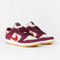 Nike SB x Skate Like A Girl Dunk Low Shoes in Dark Beetroot and Light Crimson and Light Bone thumbnail