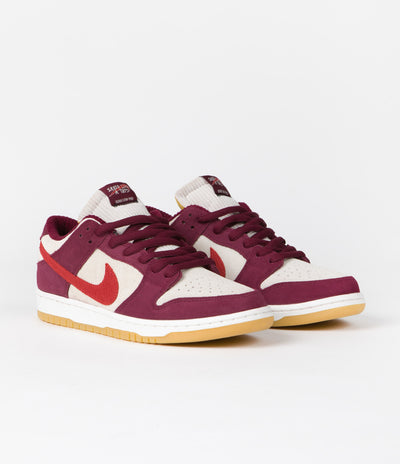 Nike SB x Skate Like A Girl Dunk Low Shoes in Dark Beetroot and Light Crimson and Light Bone