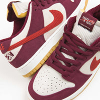 Nike SB x Skate Like A Girl Dunk Low Shoes in Dark Beetroot and Light Crimson and Light Bone thumbnail