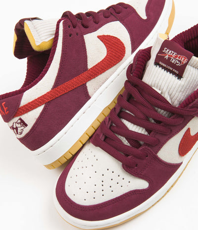 Nike SB x Skate Like A Girl Dunk Low Shoes in Dark Beetroot and Light Crimson and Light Bone