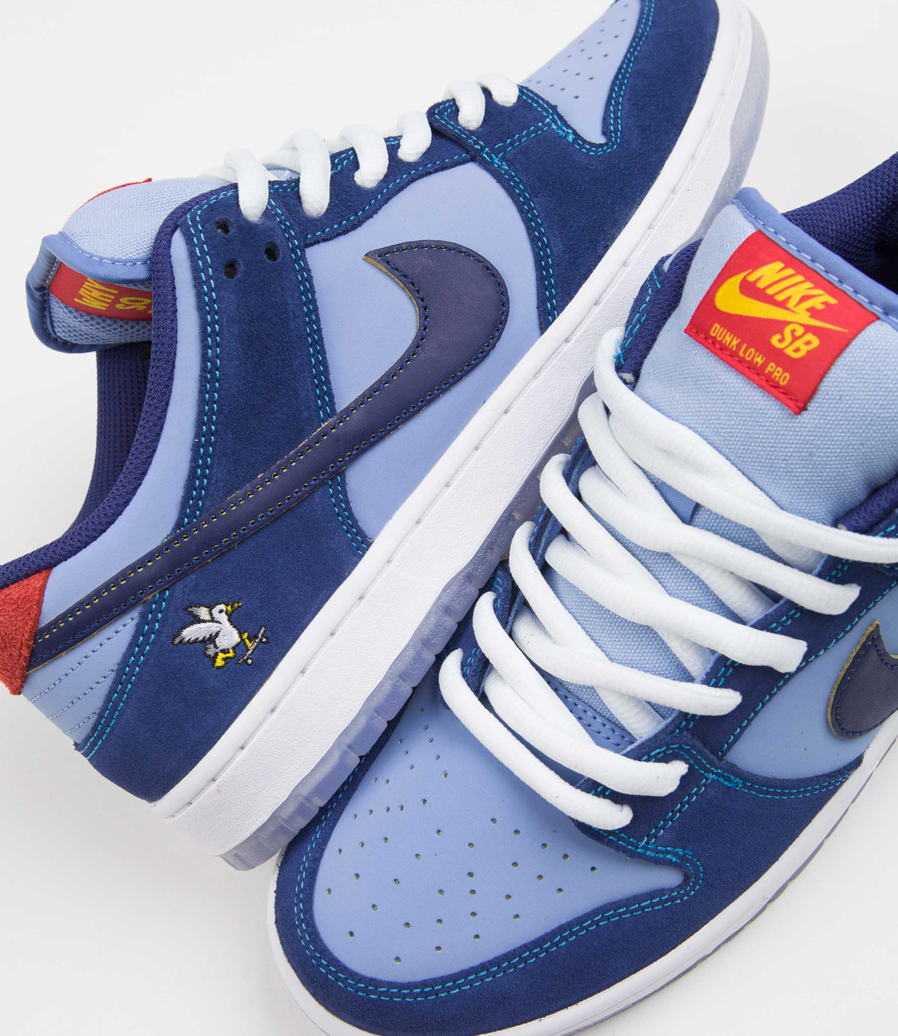 Why So Sad? × Nike SB Dunk Low Coastal Blue/Yellow-Red Nike SB x Why So Sad? Dunk Low Premium Shoes - Coastal Blue