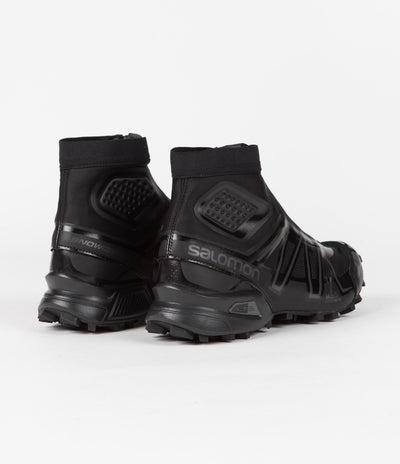 Salomon Snowcross Shoes in Black and Black / Magnet