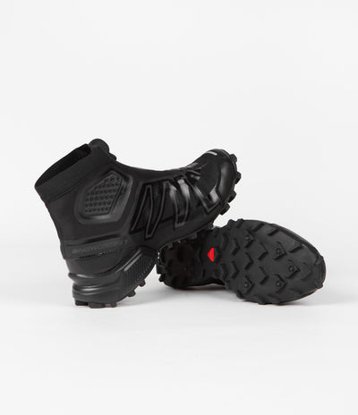 Salomon Snowcross Shoes in Black and Black / Magnet